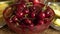 Fresh summer fruits - cherries in vintage crystal bowl on old wooden table