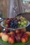 Fresh summer fruits. Organic and natural fruit on tray. Fresh grapes, cheaches, plums and strawberry. Healthy eating.