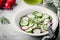 Fresh summer salad with radish and cucumber, green onions and dill