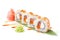 Fresh sushi rolls with tuna and tender curd cheese laid out on a banana leaf. Isolated. Sushi roll on a white background.