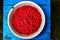 Fresh and sweet raspberries in a bowl on a stool.Healthy and vitamine food