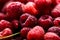 Fresh and sweet red raspberries texture. fruit pile background