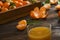 Fresh tangerine oranges on a wooden table. Peeled mandarin. Halves, slices and whole clementines closeup.