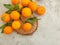 Fresh tangerines on concrete background clementine, group