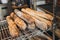 Fresh tasty Baguettes on bakery shelves. Concept of french delicious food