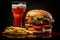 Fresh tasty beef burger with french fries and soda, dark background