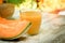 Fresh, tasty and juicy melon - cantaloupe and melon juice smoothie on table