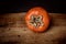 fresh and tasty persimmons on a cutting board