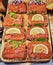 Fresh tasty sandwiches with salted salmon with lemon close-up.