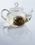 Fresh tea in glass teapot