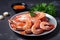 fresh tiger shrimp prawns, ready to be cooked and served on plate