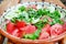 Fresh tomato salad in traditional bulgarian plate