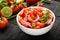 Fresh tomato salsa salad in white bowl