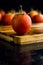 Fresh tomatoes on a on a brown wooden background. black Background. - Image