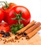 Fresh Tomatoes Shows Cinnamon Stick And Seasoning