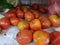 Fresh tomatoes on the vegetable rack to make tomato sauce