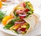 Fresh tortilla wraps with meat and vegetables