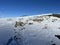 Fresh tracks on the season\\\'s first early autumn snow above the road pass Fluela (Fluelapass)