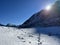 Fresh tracks on the season\\\'s first early autumn snow above the road pass Fluela (Fluelapass)