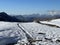 Fresh tracks on the season\\\'s first early autumn snow above the road pass Fluela (Fluelapass)