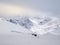 Fresh tracks on the snow slopes in Lenzerheide early in the morning