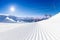 Fresh tracks of snowcat at the ski resort slopes