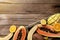 Fresh tropical fruits in a wooden box on a wooden background