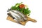 Fresh trout on wooden board with parsley, garlic, tomato, pepper and knife