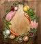 Fresh turkey, vegetable, herbs, spices ,fruit ,Lemon polka red pepper spice herbs salt pepper garlic onion on a cutting board on