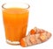 Fresh turmeric with extract in a glass