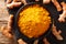 Fresh turmeric spice in a bowl and root close-up. horizontal top view