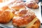 Fresh twisted buns with sesame seeds in the early morning