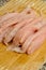 Fresh uncooked chicken meat breast pieces, ready to cook