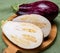 Fresh uncooked graffiti or Sicilian eggplants vegetables with purple and white stripes