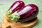 Fresh uncooked graffiti or Sicilian eggplants vegetables with purple and white stripes