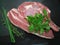 Fresh uncooked rump steak with herbs