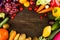 Fresh various vegetable and fruits put on dark wood background