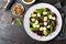 Fresh vegetable salad with boiled beet, mangold leaves, walnuts and quail eggs