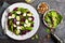 Fresh vegetable salad with boiled beet, mangold leaves, walnuts and quail eggs