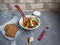 Fresh vegetable salad with feta cheese, two slices of bread