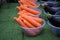 Fresh vegetables of carrots and aubergines in bowls with space