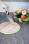 Fresh vegetables on chopping board and dark table. A composition of vegetables