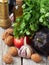 Fresh vegetables, herbs, spices are located on a wooden vintage surface. Procurement for dishes of Caucasian cuisine. Close-up