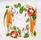 Fresh vegetables ingredients for cooking , composing on white wooden background, top view, frame. Healthy food