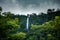 Fresh vegetation at Anton Valley in Panama with a waterfall and cloudscape