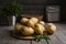 Fresh and versatile potatoes showcased on indoor kitchen table