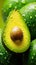 A fresh and vibrant avocado with water droplets glistening on its surface