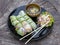 Fresh vietnamese spring rolls on a plate with salad