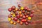 Fresh washed heirloom cherry tomatoes on wood background