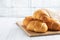 Fresh wheat bread rolls. Rolls for a hot dog or hamburger. White background copy space.